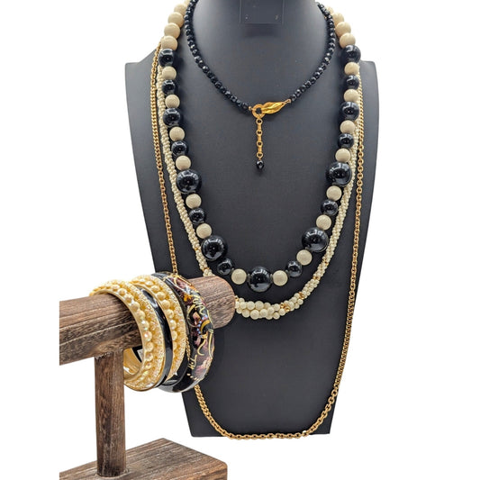 Lot of Ten Cream Black Jewelry Pieces -- Four Necklaces & Six Bracelets