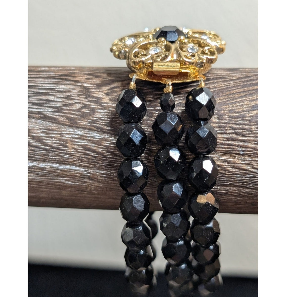 VTG Black Faceted Glass Bead Triple Strand Bracelet W/ Ornate Gold Tone Clasp