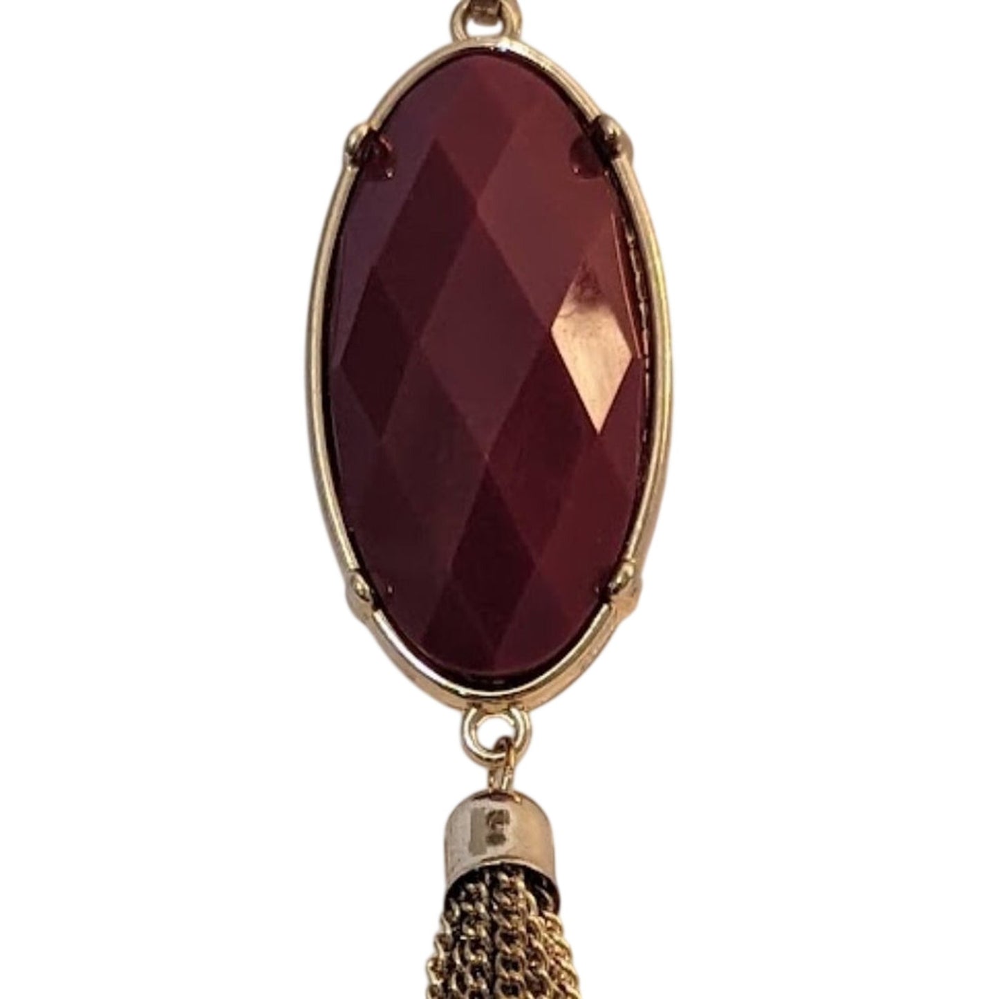 Long Gold Tone Red Reversible Pendant With Tassel