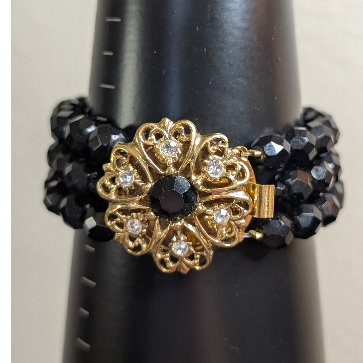 VTG Black Faceted Glass Bead Triple Strand Bracelet W/ Ornate Gold Tone Clasp