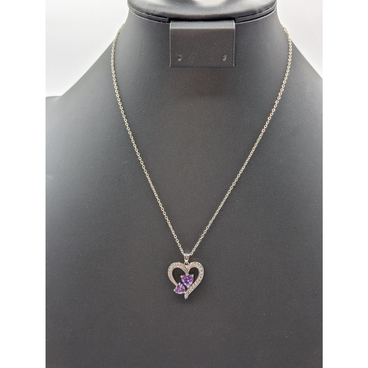 Two Purple Crystal Hearts Within A CZ Studded Heart Silver Tone Pendant Necklace