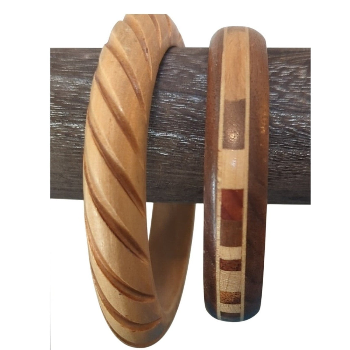 Two Wooden Bangle Bracelets One Carved with Swirl Pattern and One Inlay