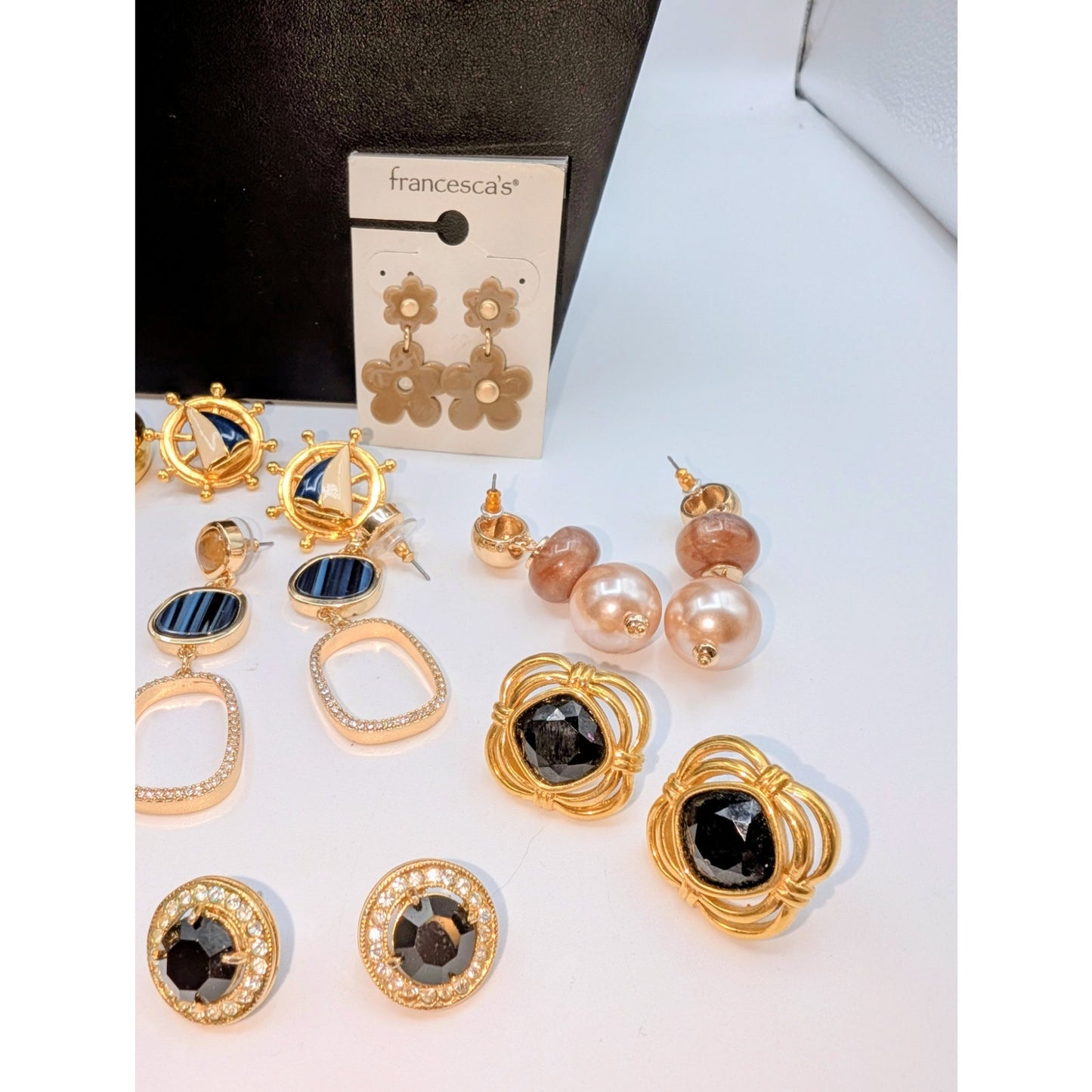 Eleven Pair of Gold Tone Pierced Earrings