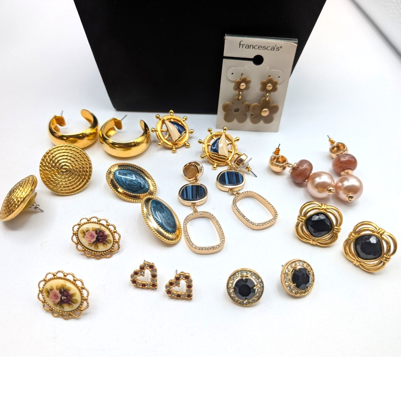 Eleven Pair of Gold Tone Pierced Earrings