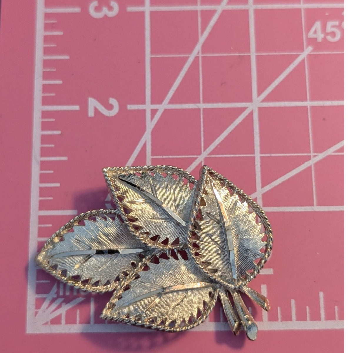 Vintage Signed BSK Gold Tone Four Leaf Textured Diamond Cut BROOCH
