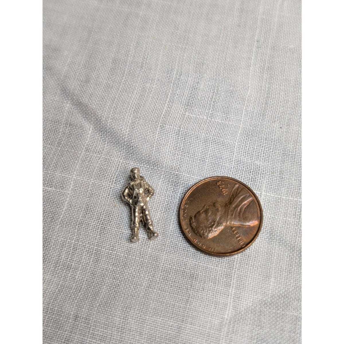 Vintage Tiny Silver Tone Man W/ Hands on Hips Possibly Astronaut Charm