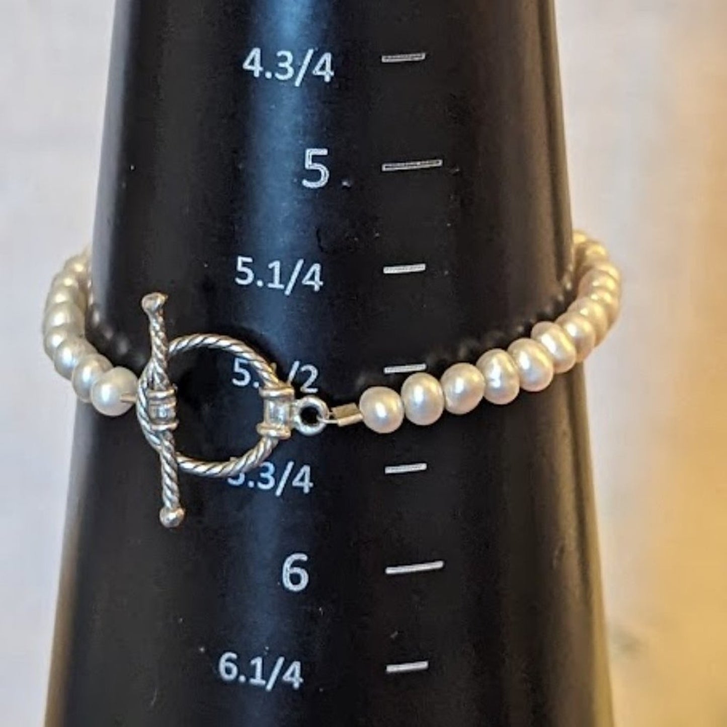 Two Tiny Silver Tone Bracelets
