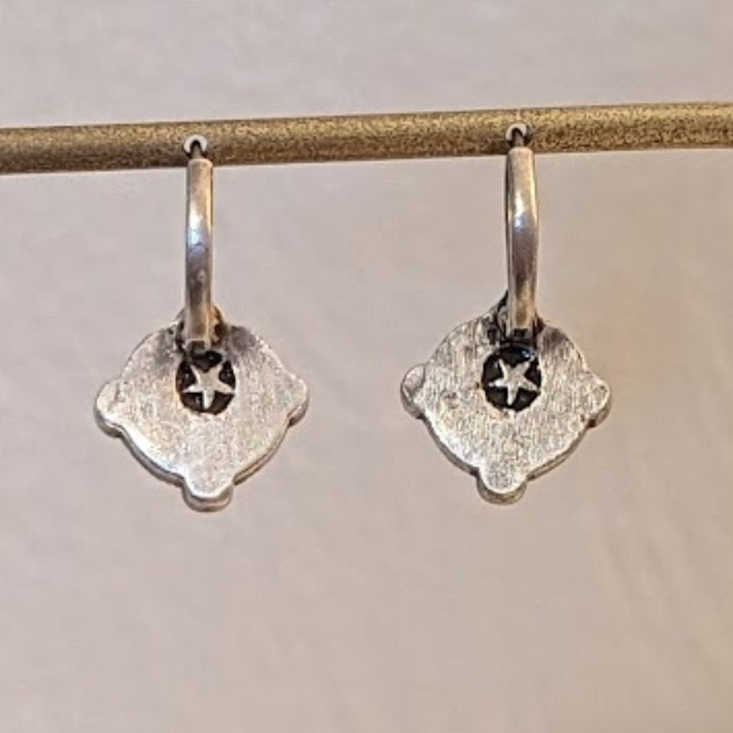 Three Pair of Silver Tone Earrings and One Textured Leaf Wreath Brooch