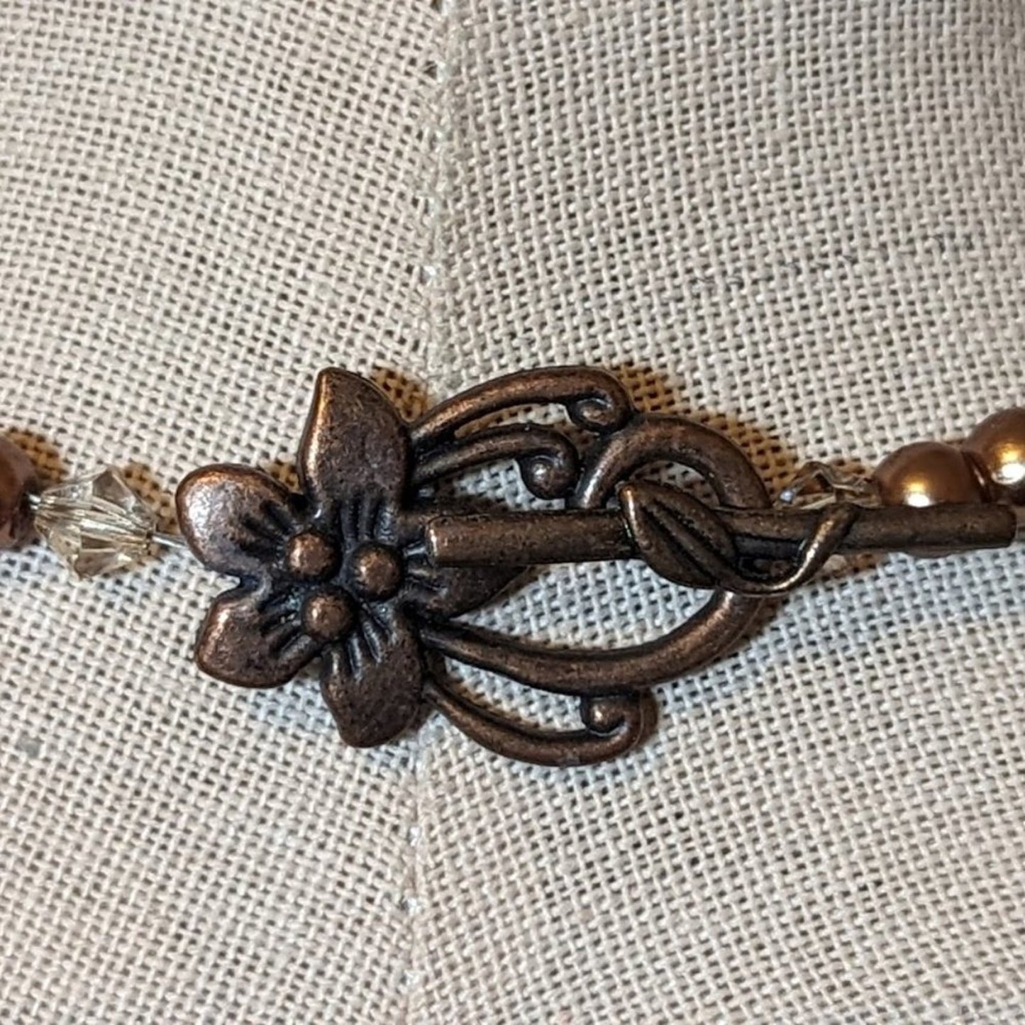 Bronze and Briolette Glass Bead Necklace with Flower Pendant and Toggle Clasp
