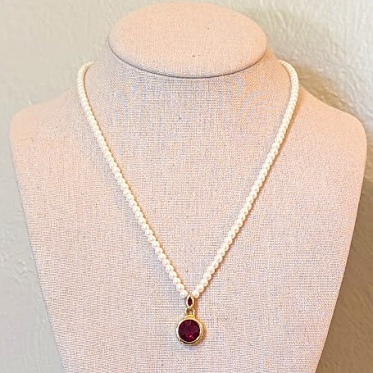 Faux Pearl Necklace with Bezel Set Red Crystal Pendant Set in Gold Tone Metal