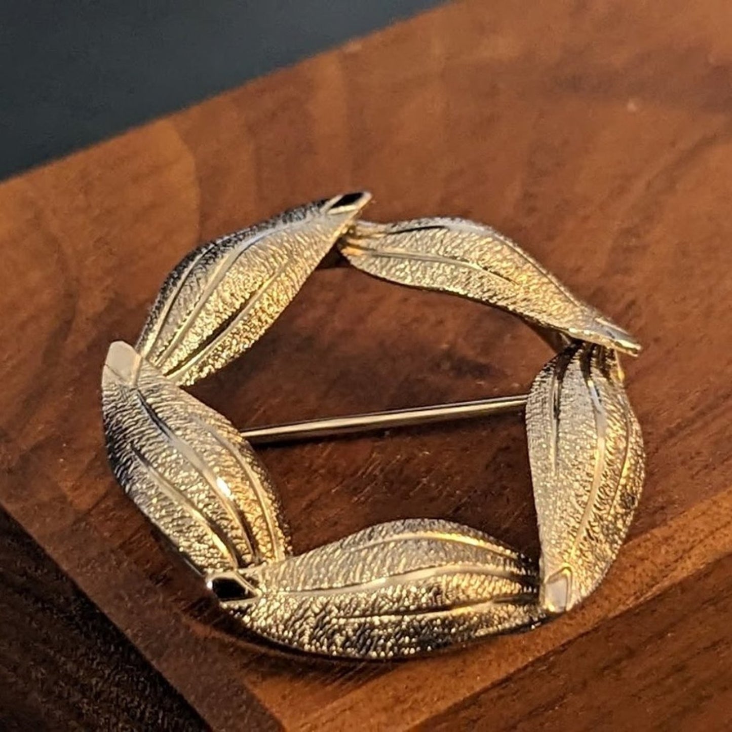 Three Pair of Silver Tone Earrings and One Textured Leaf Wreath Brooch