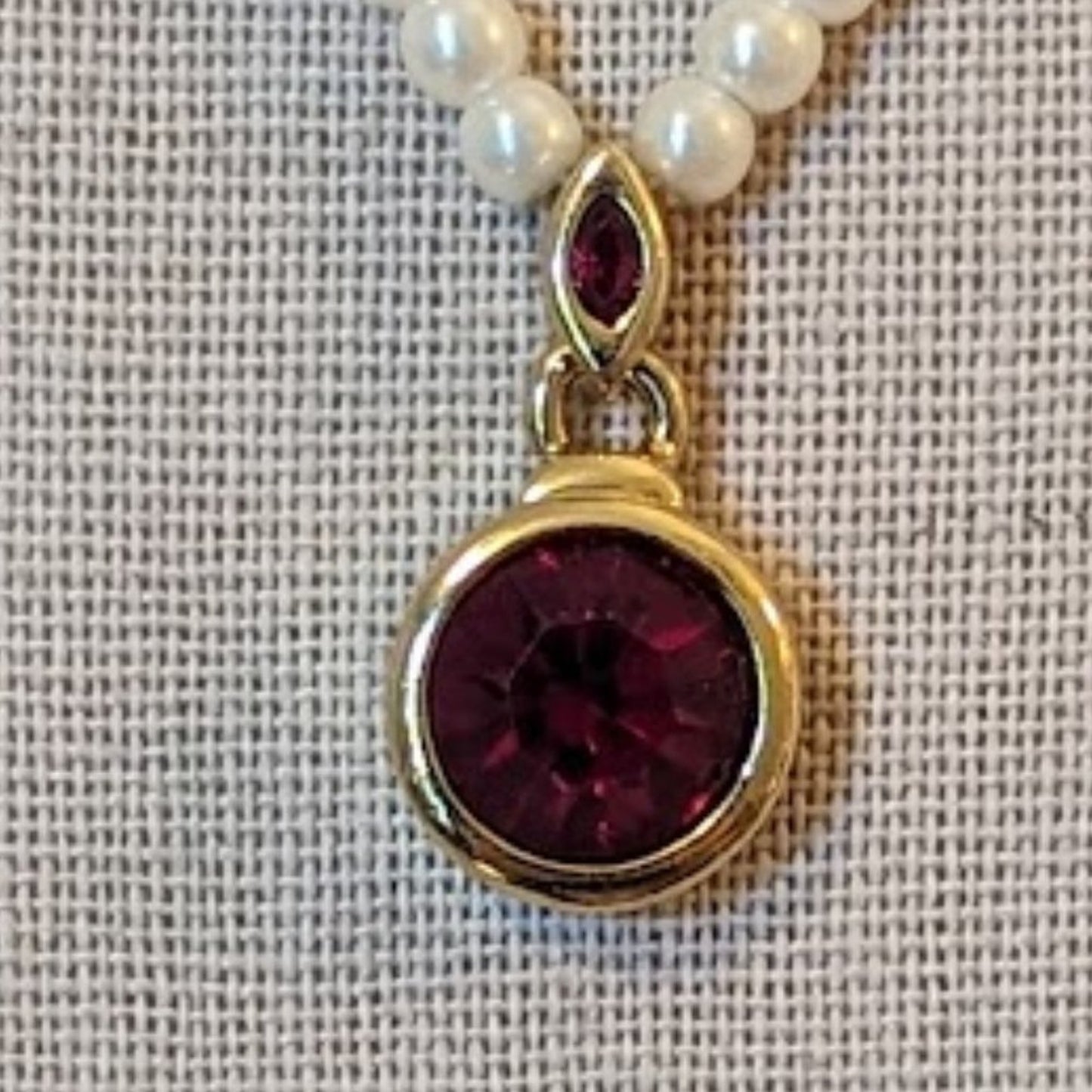 Faux Pearl Necklace with Bezel Set Red Crystal Pendant Set in Gold Tone Metal
