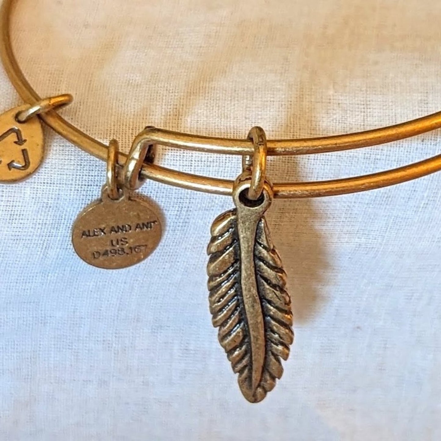 Alex and Ani Feather Charm Gold Tone Adjustable Slide Bangle Bracelet